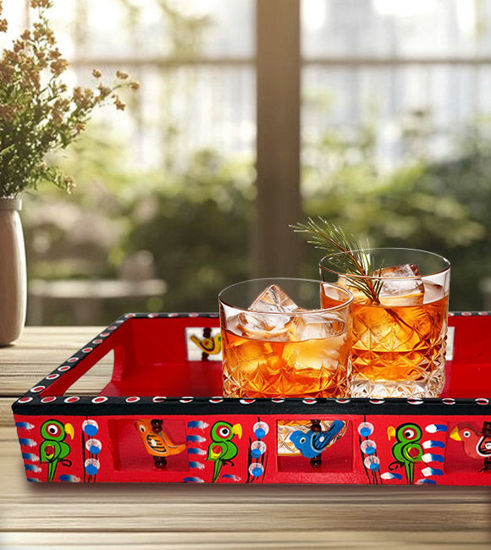 Decorative wooden platter with two beverages, exemplifying Channapatna craftsmanship and enhancing kitchen aesthetics.